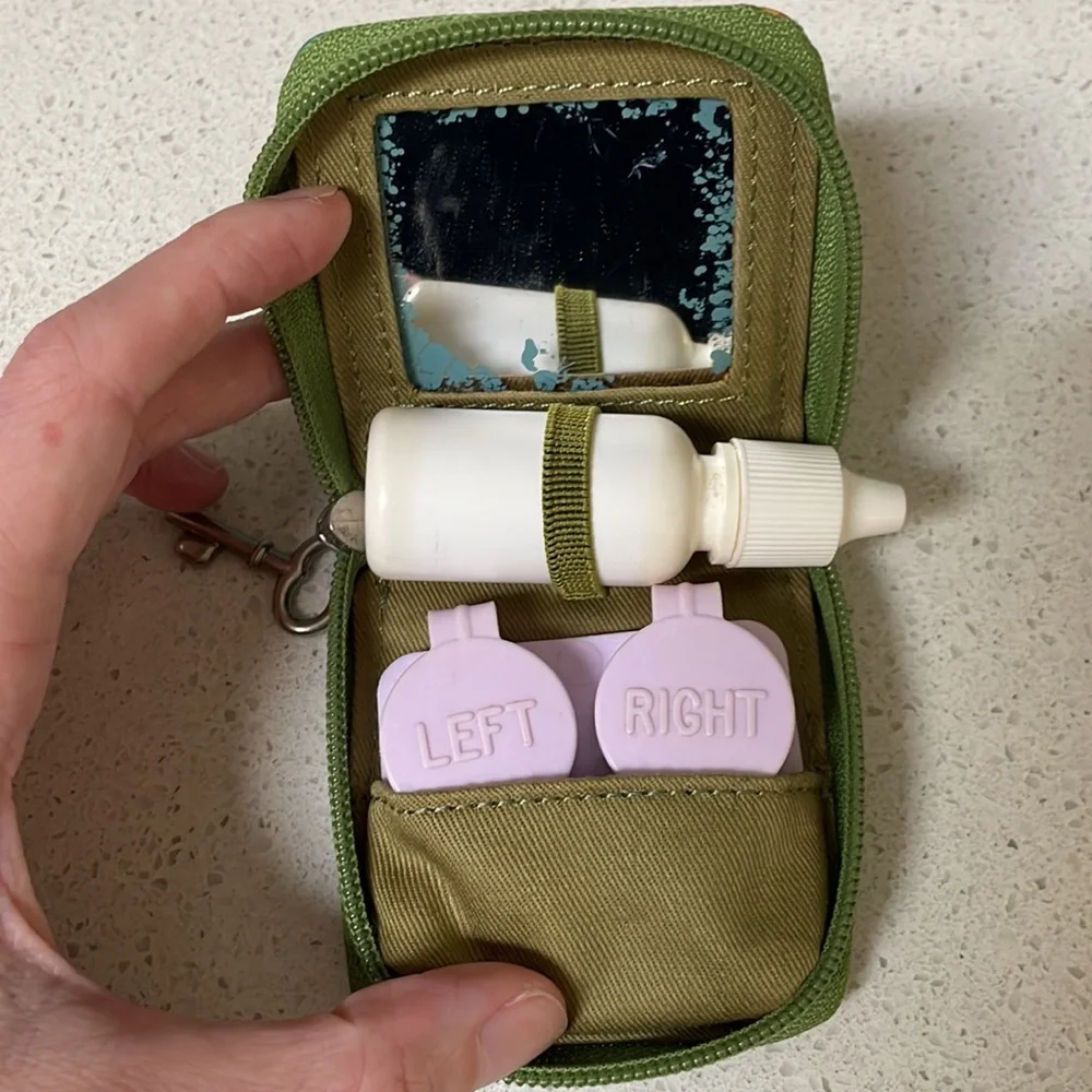 Fossil green leather travel contact lens carrying case